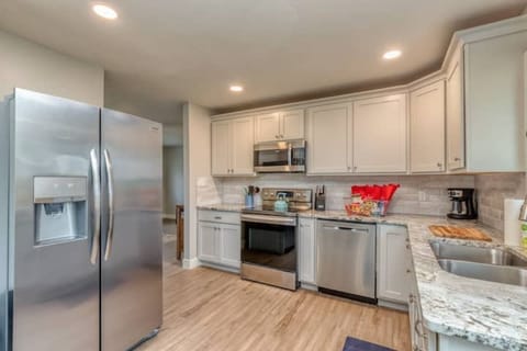 Fully stocked kitchen with new appliances, starter coffee and spices and more.