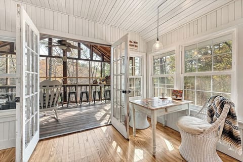 
With the fully screened in upper back deck, you can leave the French doors open, and take it all in!