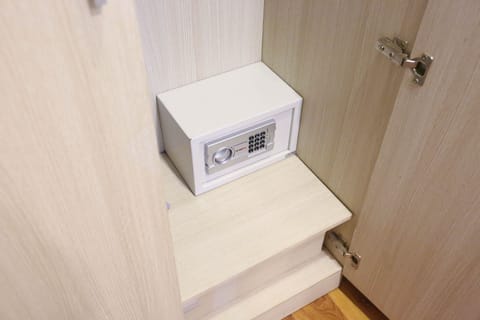 Standard Quadruple Room | Minibar, in-room safe, desk, laptop workspace