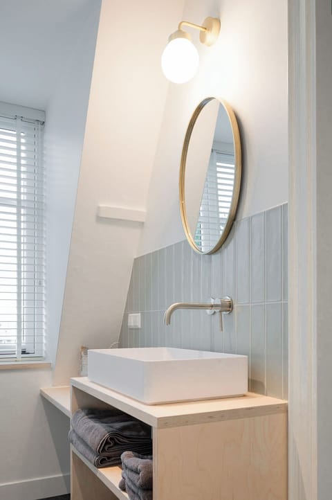 Comfort Room | Bathroom | Hair dryer, towels, soap, shampoo