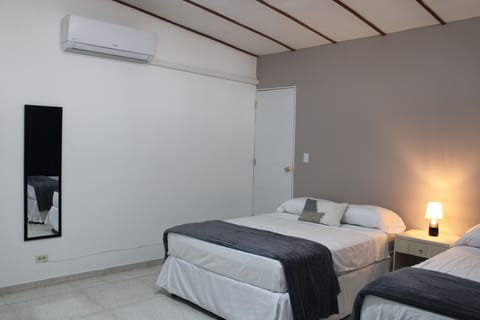 Executive Double Room, 2 Queen Beds | Premium bedding, individually furnished, desk, laptop workspace