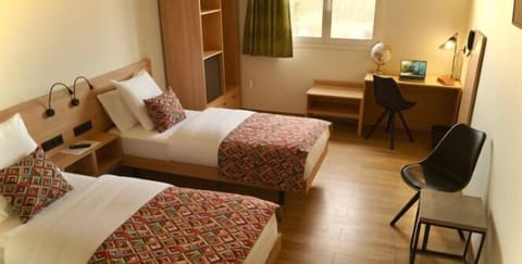 Twin Room | Desk, blackout drapes, soundproofing, iron/ironing board