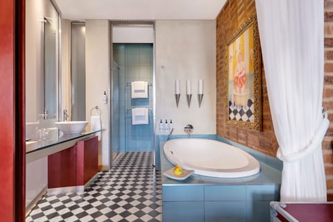 Room, 1 King Bed, Smoking | Bathroom | Separate tub and shower, deep soaking tub, rainfall showerhead