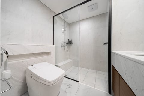 Family Room, 2 Bedrooms | Bathroom | Shower, hair dryer, slippers, bidet