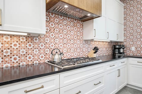 Spacious kitchen with gas stove