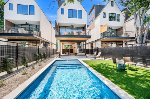 Porter Haus at Camp Warnecke-Heated pool with outdoor seating and Comal River views