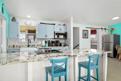 Kitchen with granite counter and modern appliances