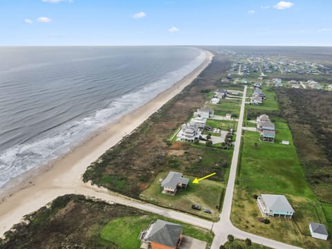 Long wide beach just outside the house, endless views. House is on 0.7 acre land