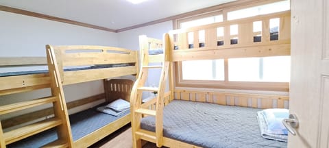 Basic Room | Premium bedding, down comforters, memory foam beds, desk