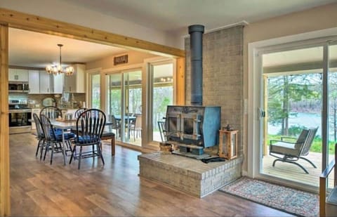 Open concept showing wood stove. Views from every room