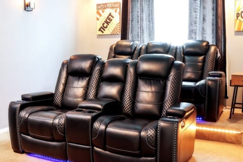 Theater-style seating with an elevated second row for easy viewing. Adjust your headrest, recline your seats, and enjoy a perfect movie night with family/friends.