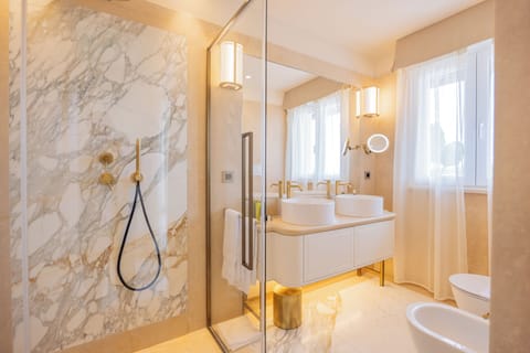 Hair dryer, bidet, towels, soap