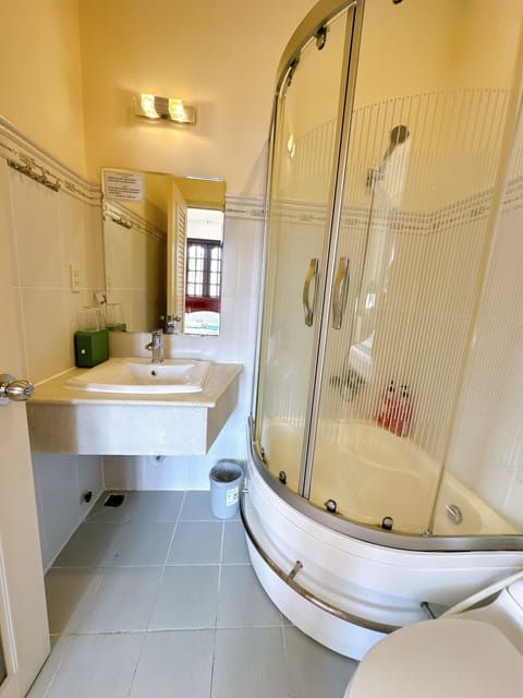 Deluxe Double Room, 1 Queen Bed | Bathroom | Separate tub and shower, rainfall showerhead, designer toiletries