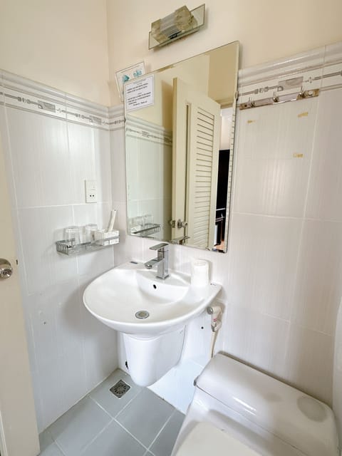 Superior Twin Room, City View | Bathroom | Separate tub and shower, rainfall showerhead, designer toiletries