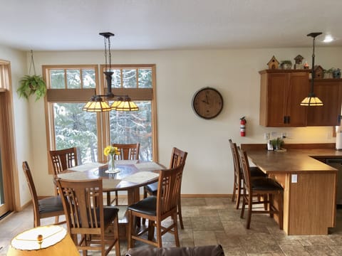 Dining table and counter top seats 8.
6ft folding table & 4 folding chairs avail