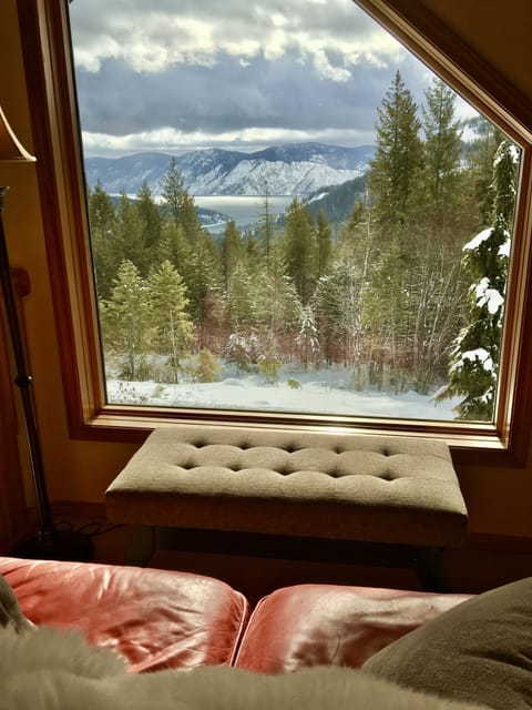 Gorgeous lake and mountain view from the little red couch upper living room