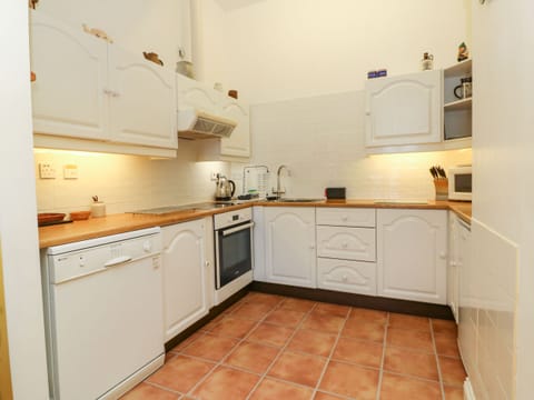 Fridge, electric kettle, toaster, cookware/dishes/utensils