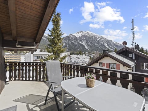 Cloud, Sky, Table, Building, Property, Furniture, Flowerpot, Mountain, Window, Porch