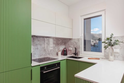 Apartment (One Bedroom Apartment) | Private kitchen | Fridge