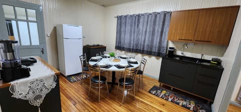 Full-size fridge, microwave, blender, cookware/dishes/utensils