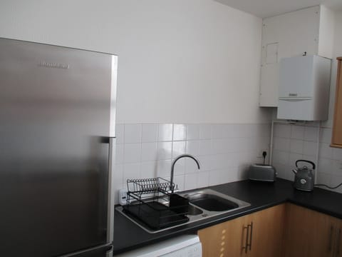 Apartment | Private kitchen | Fridge, microwave, oven, stovetop