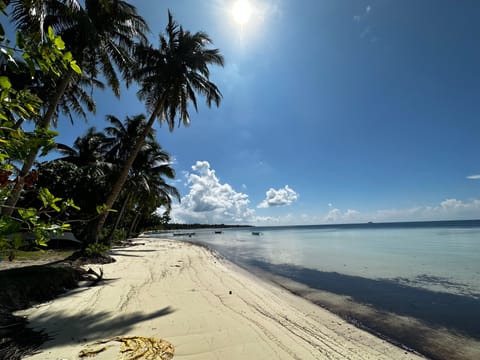 On the beach, white sand