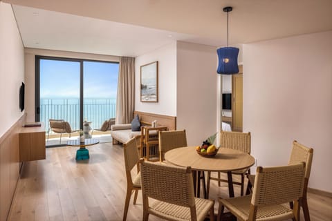 Luxury Suite, 3 Bedrooms, Ocean View | Living room | 55-inch Smart TV with digital channels