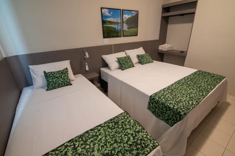 Family Triple Room | Minibar, desk, free WiFi, bed sheets