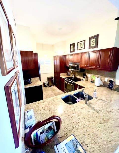 Beautiful woods and stainless steel appliances. The kitchen is stocked for you!