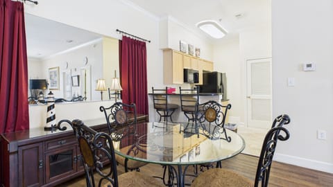 Dining table in main living area that seats 4