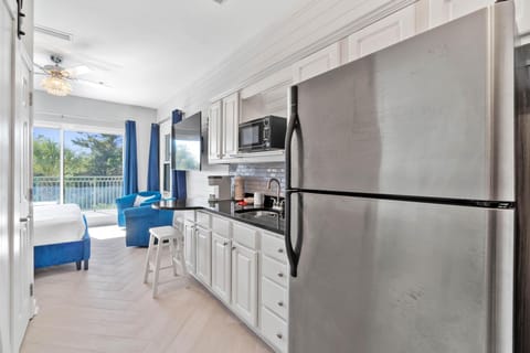 Kitchenette with microwave and full size refrigerator