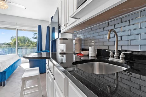 Kitchenette with microwave and full size refrigerator