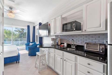 Kitchenette with microwave and full size refrigerator