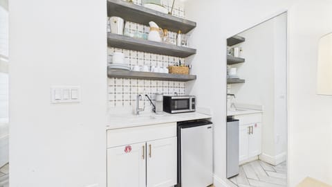 Kitchenette with microwave and under counter refrigerator