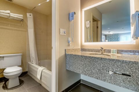 Standard Room, 2 Queen Beds, Non Smoking | Bathroom | Combined shower/tub, deep soaking tub, free toiletries, hair dryer