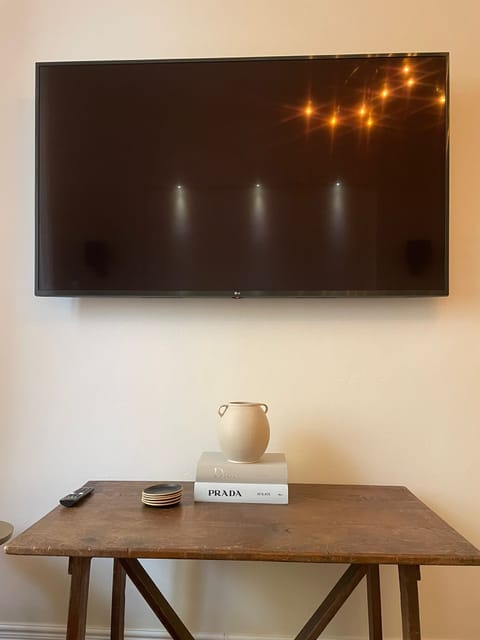 65" LCD TV opposite of couch in bedroom 3.  Sonos bar has now been added.