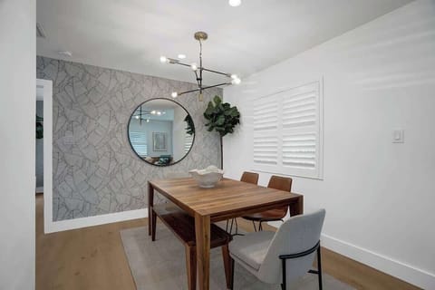 Villa 4 (2/2 unit) Dining room, which is adjacent to the kitchen and living room in the open floor plan. Once of 3 dining spaces for you to eat or work from.