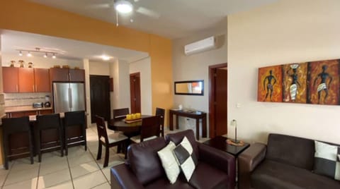 Elite Apartment | Living area | 50-inch plasma TV with digital channels, TV