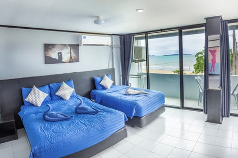 Premium Double Room, Balcony, Ocean View | Living area | 32-inch Smart TV with cable channels, TV