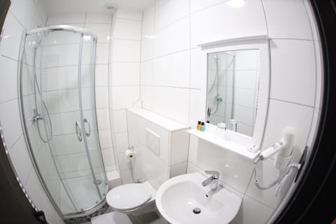 Basic Single Room | Bathroom | Free toiletries, hair dryer, slippers, towels