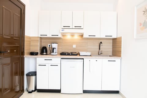 Apartment | Private kitchen | Fridge, stovetop, electric kettle, toaster