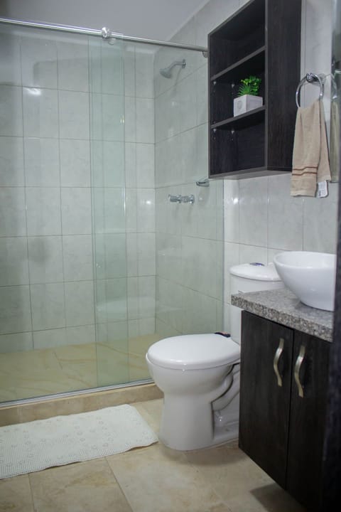 Apartment | Bathroom | Shower, rainfall showerhead, hair dryer, towels