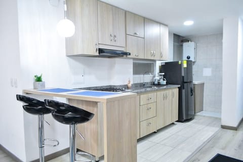 Apartment | Private kitchen | Full-size fridge, microwave, stovetop, dishwasher