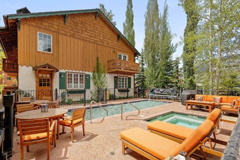 The pool and hot tub area is a great place to relax during your stay at the Alpenblick condos!