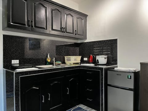 Economy Suite | Private kitchen | Mini-fridge, stovetop, toaster, rice cooker