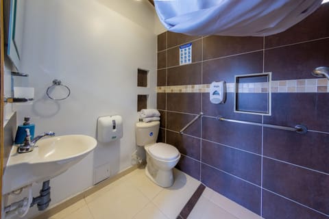 Standard Double Room | Bathroom | Shower, towels, soap, toilet paper