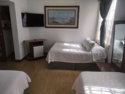 Triple Room | In-room safe, blackout drapes, free WiFi, bed sheets