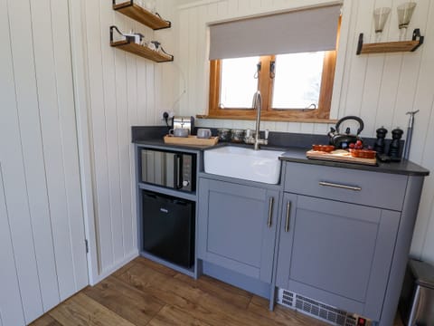 Fridge, electric kettle, toaster, cookware/dishes/utensils