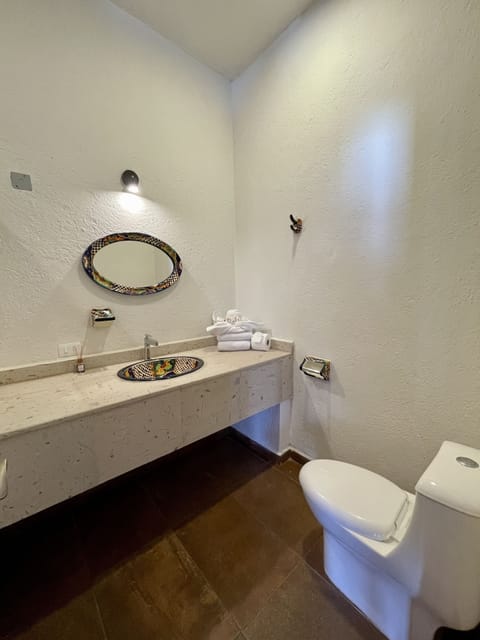 Shower, rainfall showerhead, hair dryer, towels