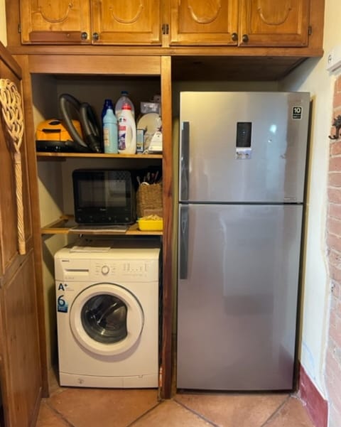 Laundry Room, Property, Washing Machine, Cabinetry, Clothes Dryer, Home Appliance, Wood, Interior Design, Kitchen Appliance, Floor